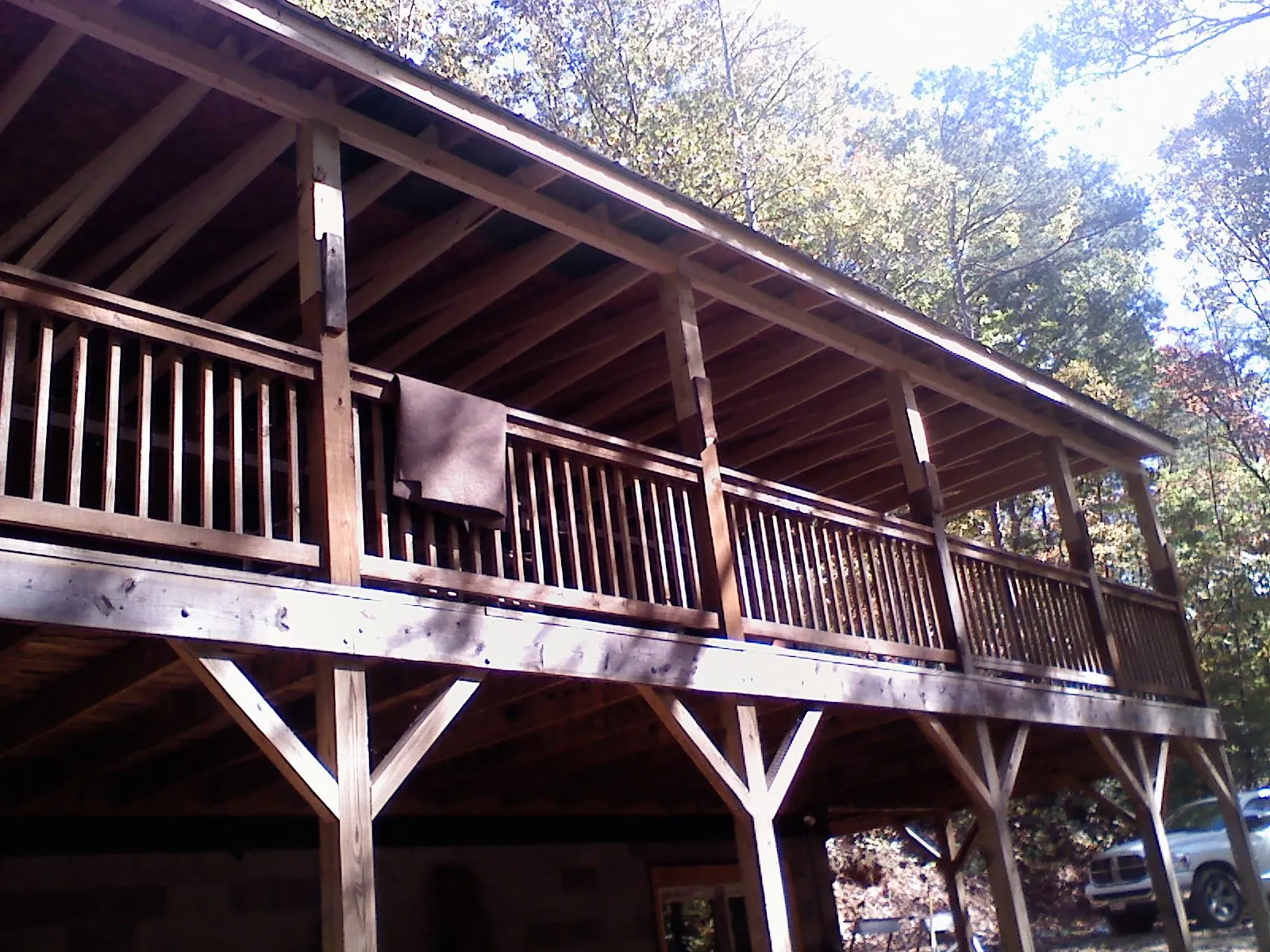 Timber framing under a new elevated porch and deck — Roof Leak Repair in Gladewater by Roofing Brothers